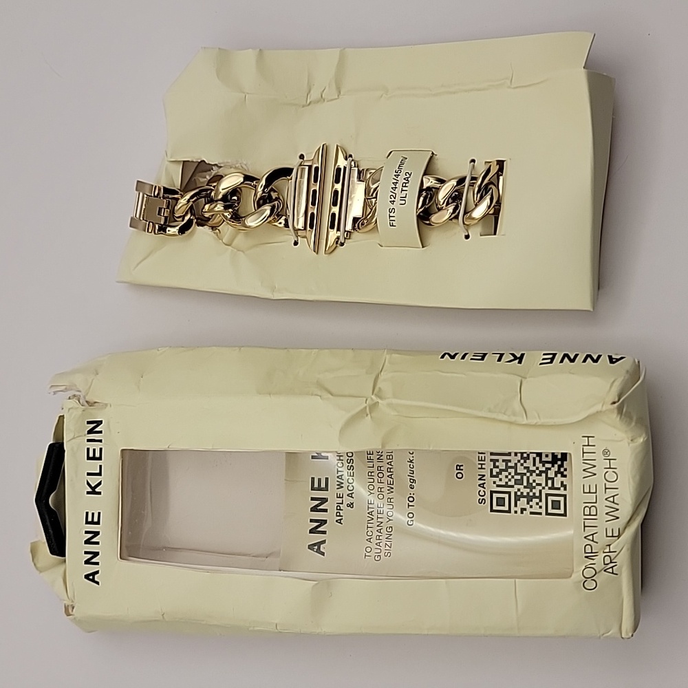 Anne Klein open (and beat up box) gold toned apple watch band